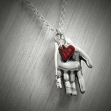 Red Heart in Hand Necklace
